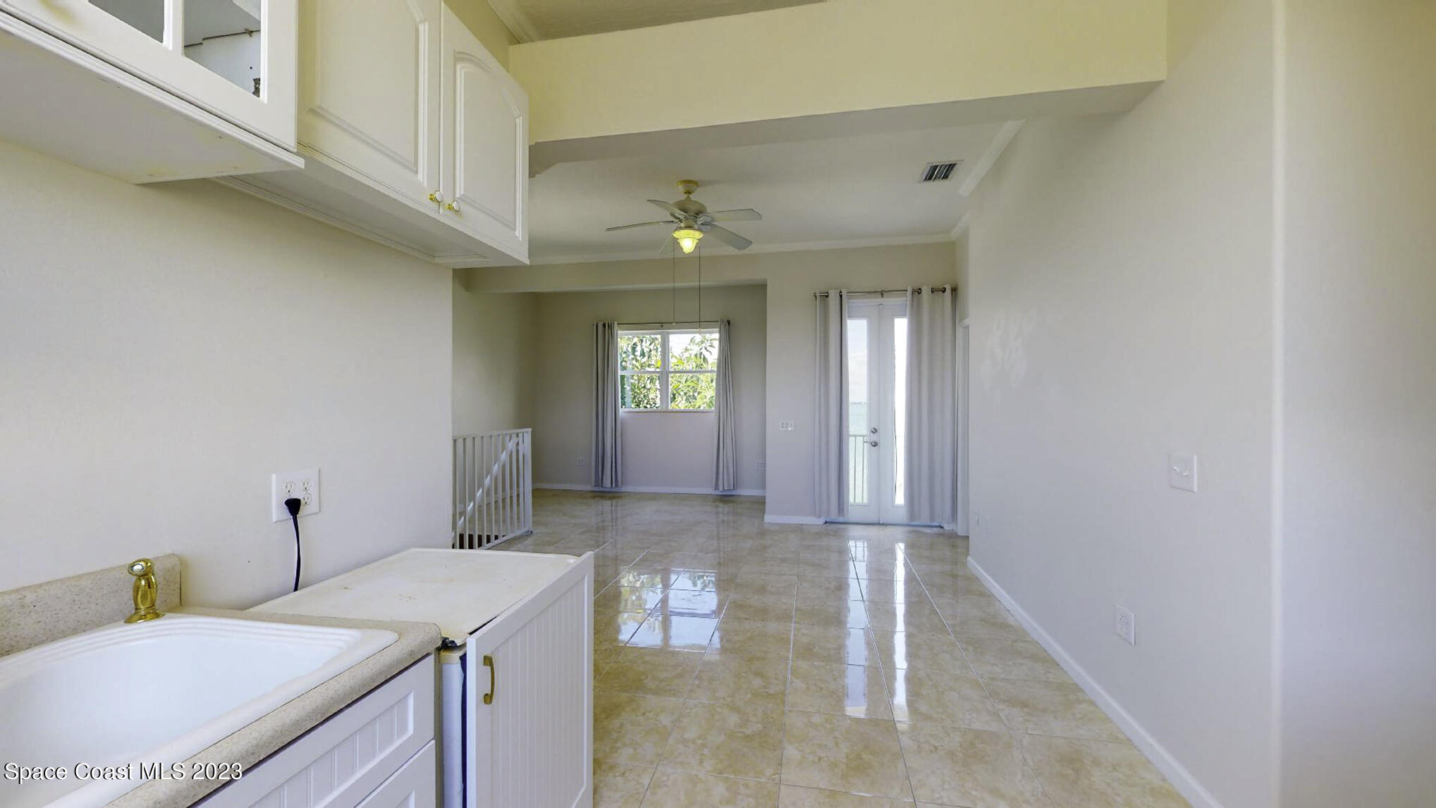 21 West Point Drive, Unit 101 Cocoa Beach, FL 32931 - Photo 50 of 59 In Law Kitchen