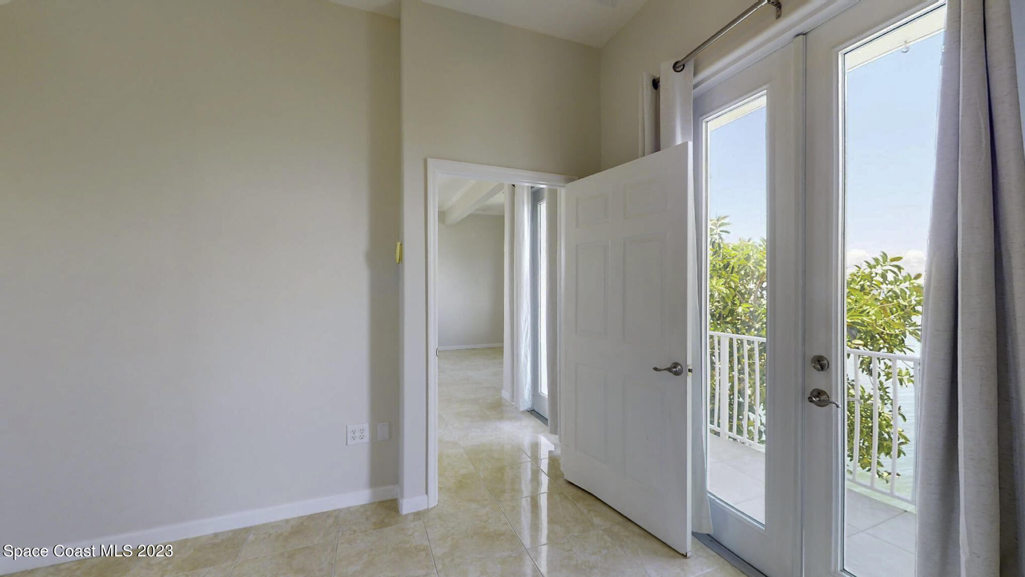 21 West Point Drive, Unit 101 Cocoa Beach, FL 32931 - Photo 53 of 59 a view of entryway with window