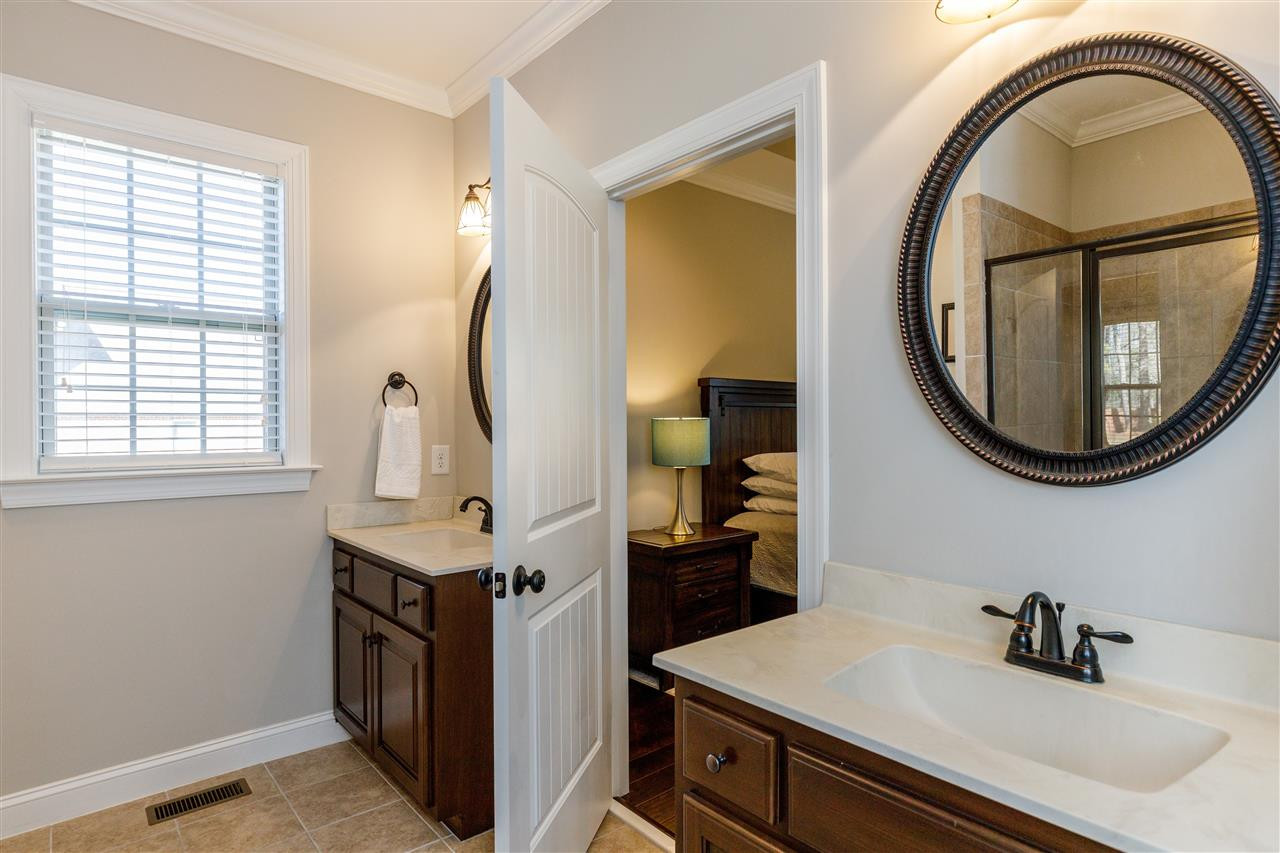 3139 Constance Circle Raleigh, NC 27603 - Photo 17 of 30 Dual Vanities, tiled floored and great cabinet space Master Bath