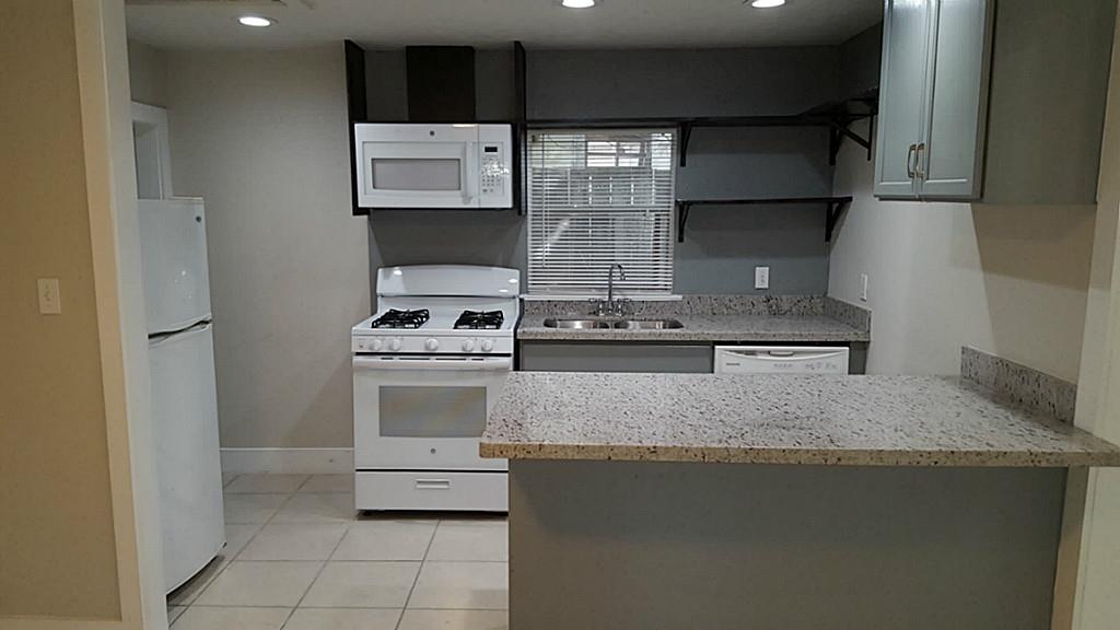 2021 West Main Street, Unit A Houston, TX 77098 - Photo 2 of 20 Recently upgraded Kitchen with Granite & Recessed Lighting.