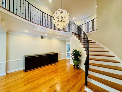 a view of entryway with wooden floor