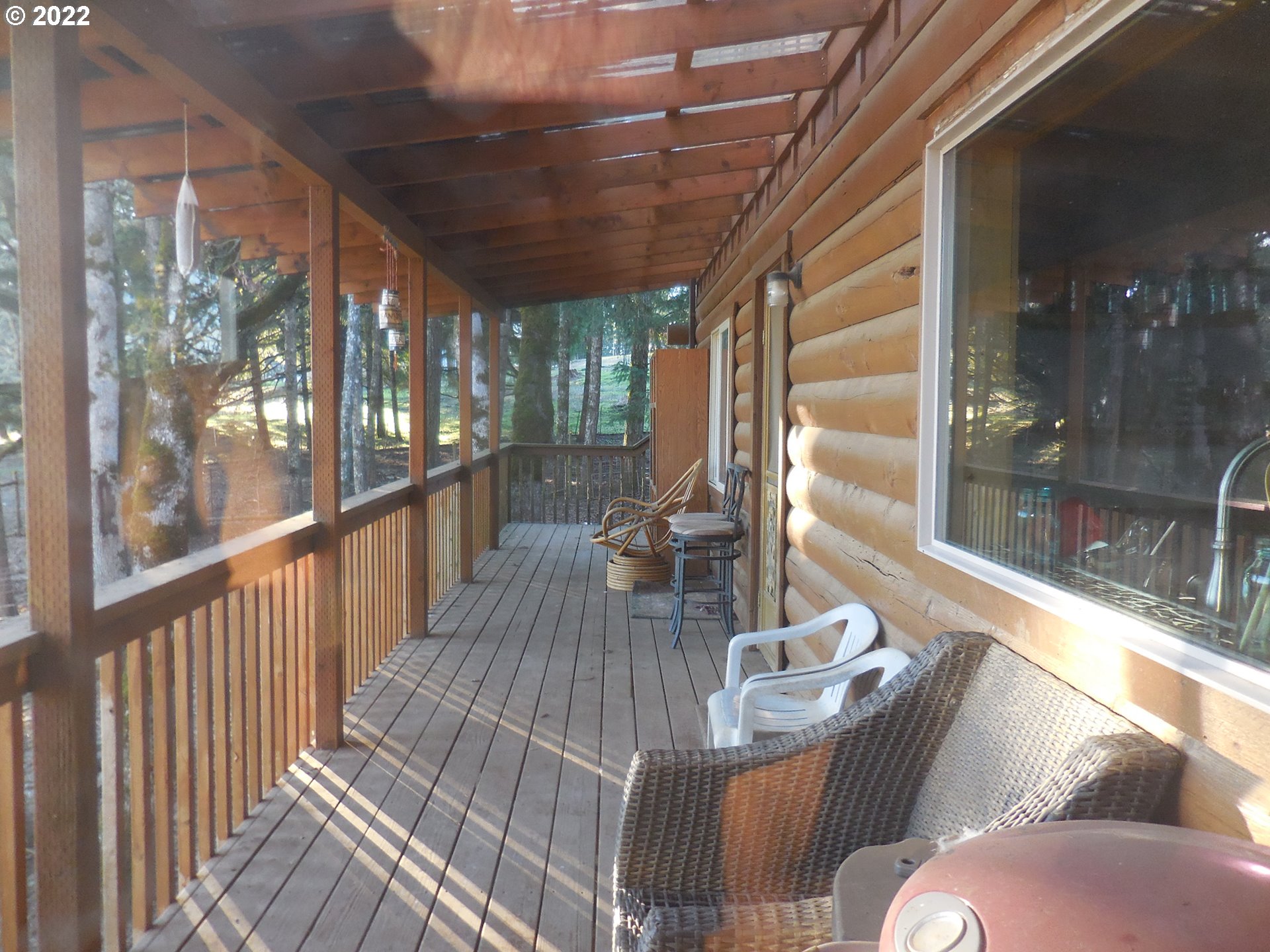 18480 Falls City Road Dallas, OR 97338 - Photo 19 of 32 a view of balcony with furniture and wooden floor