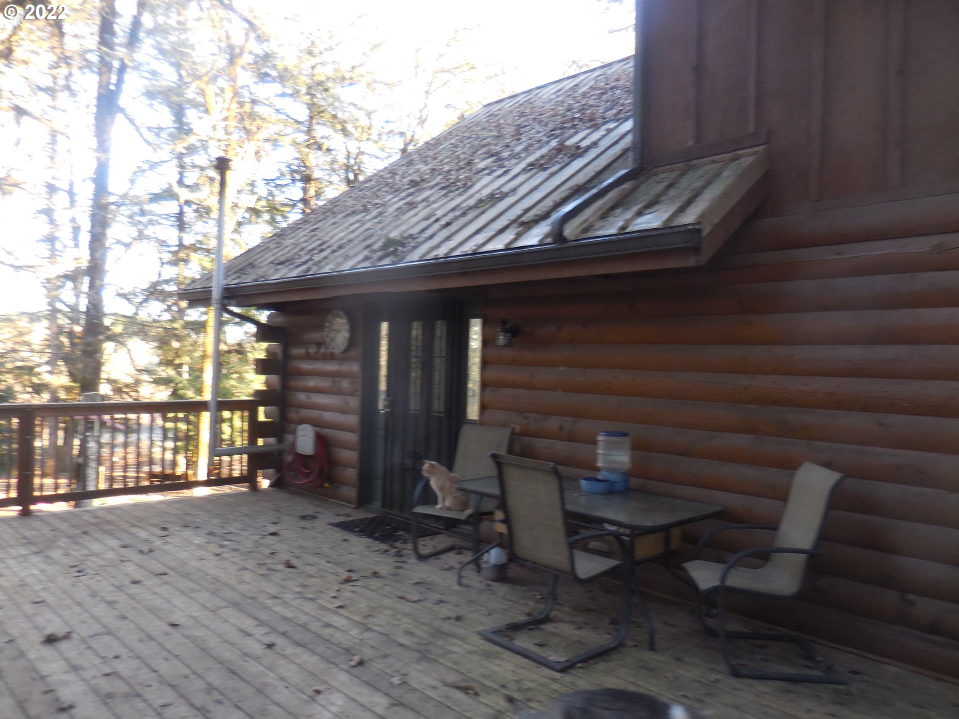 18480 Falls City Road Dallas, OR 97338 - Photo 4 of 32 a backyard of a house with barbeque oven table and chairs