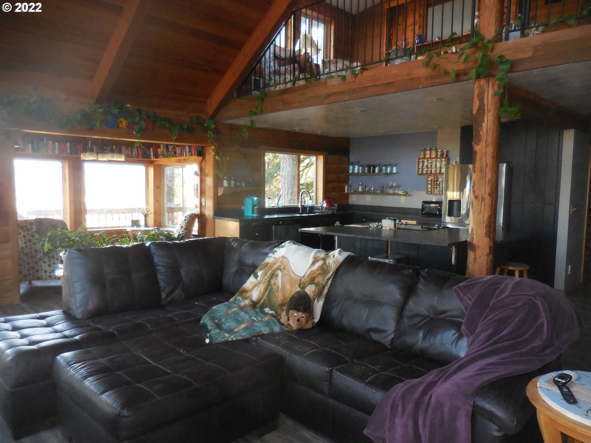 18480 Falls City Road Dallas, OR 97338 - Photo 10 of 32 a living room with furniture and a large window