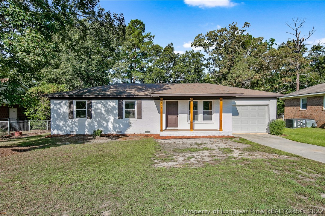 front view of a house with a patio