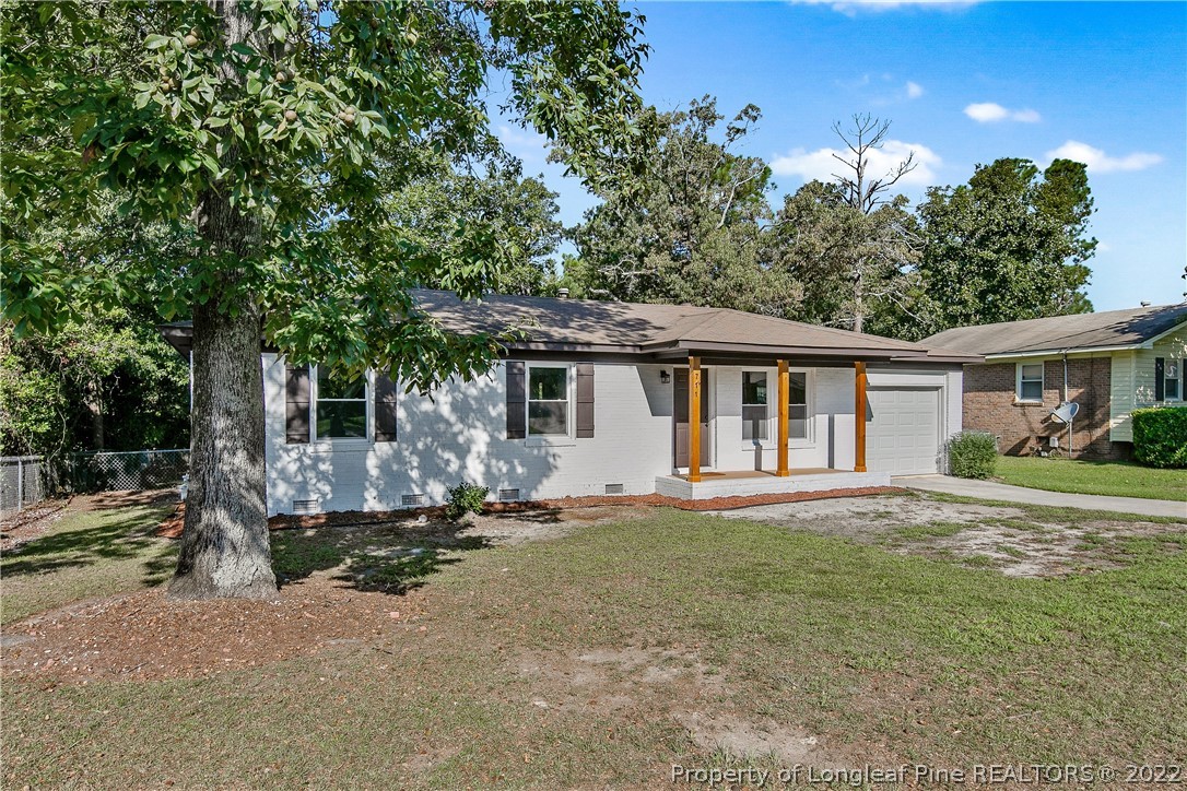 711 Bronco Road Fayetteville, NC 28303 - Photo 2 of 42 front view of a house with a patio