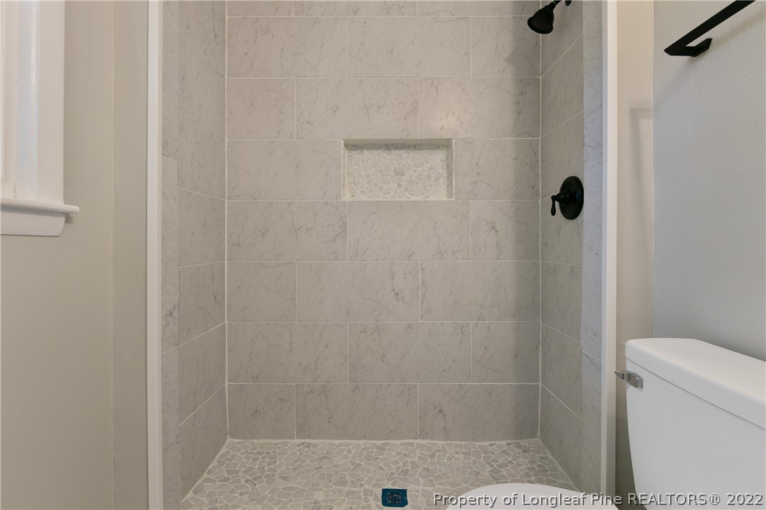 711 Bronco Road Fayetteville, NC 28303 - Photo 27 of 42 a bathroom with a shower