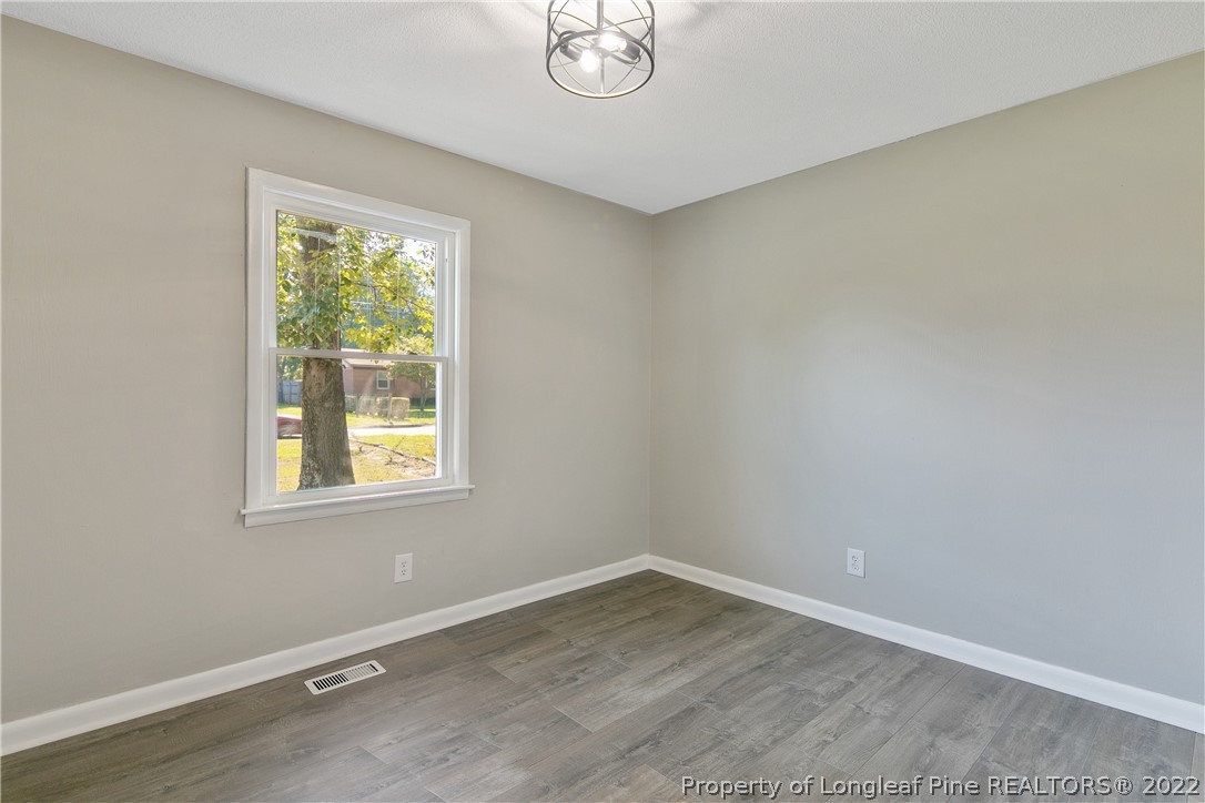 711 Bronco Road Fayetteville, NC 28303 - Photo 35 of 42 an empty room with a window