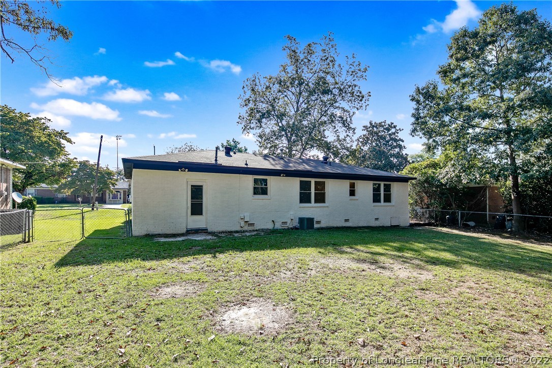 711 Bronco Road Fayetteville, NC 28303 - Photo 42 of 42 a view of a house with a yard
