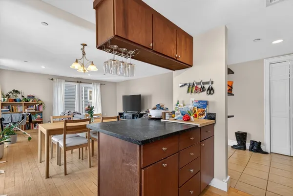 a kitchen with a cabinets a counter space and a sink