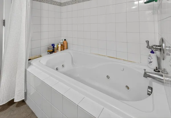 a bathroom with a bathtub