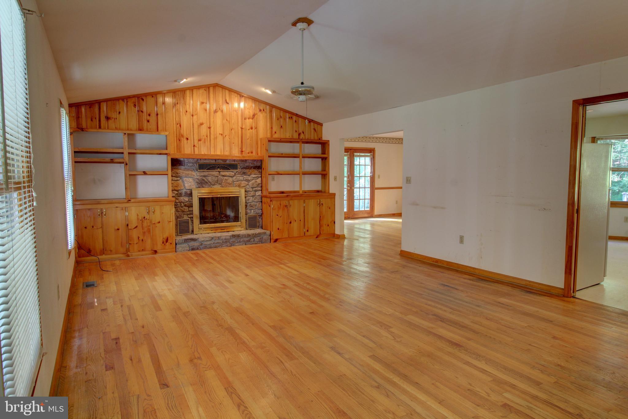 669 Gid Brown Hollow Road Washington, VA 22747 - Photo 12 of 54 Inviting living room with wood-burning fireplace