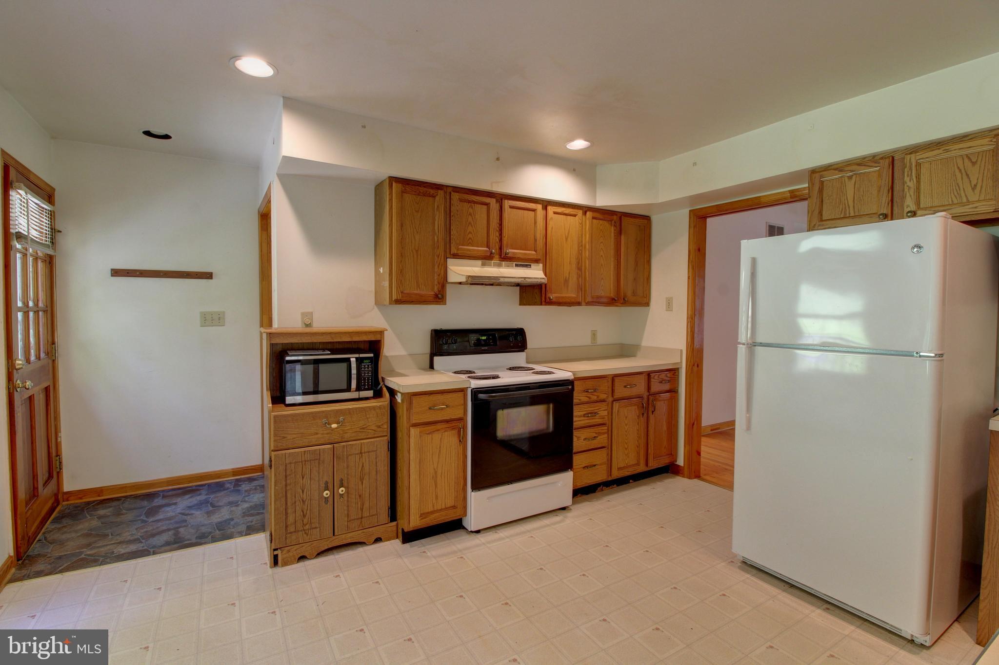 669 Gid Brown Hollow Road Washington, VA 22747 - Photo 8 of 54 Solid, original cabinetry and appliances