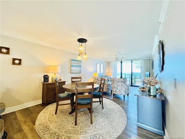 a kitchen with a table and chairs