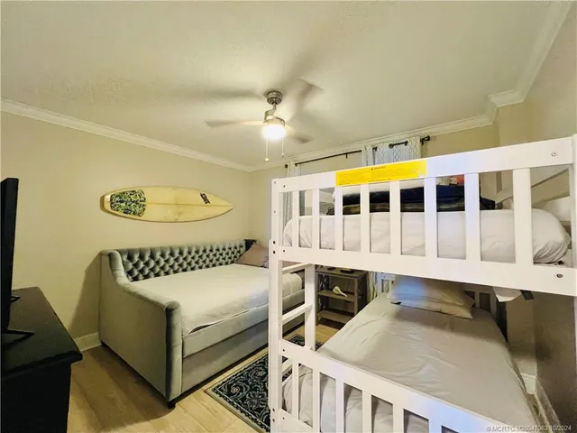 a bathroom with a toilet a sink and a mirror