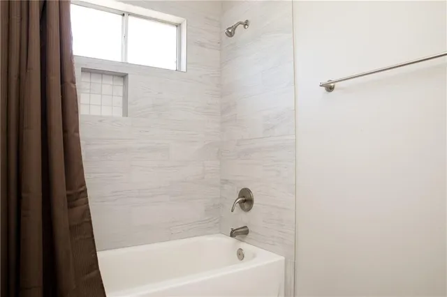 a bathroom with a bathtub