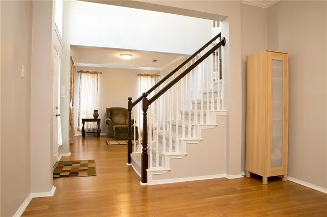 a view of entryway and livingroom with furniture