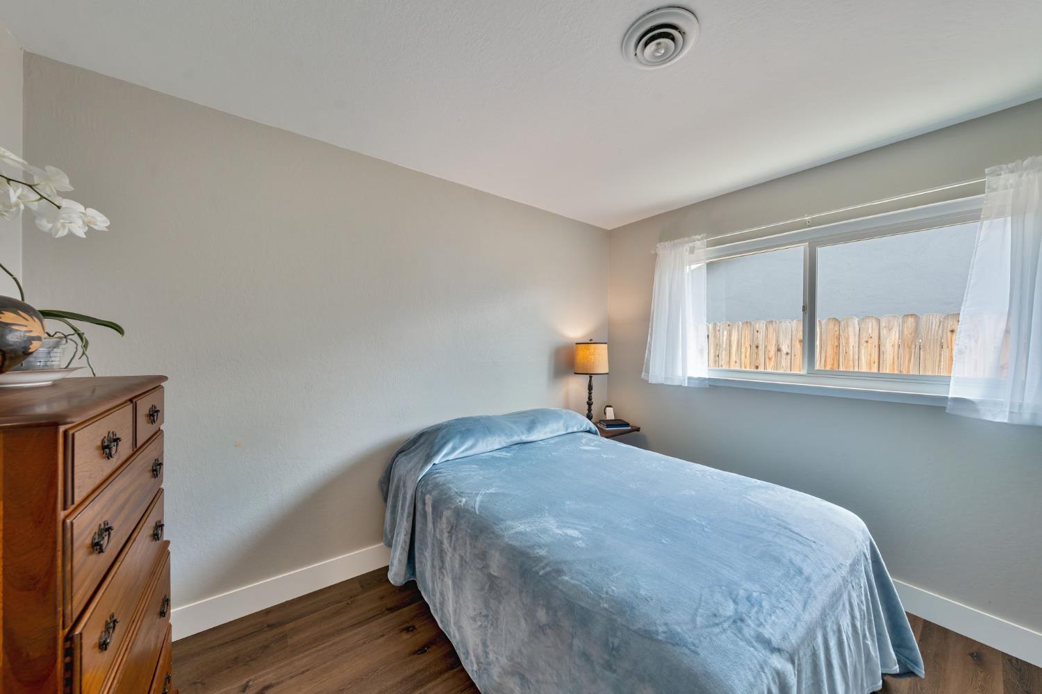 5422 Earnell Street Carmichael, CA 95608 - Photo 25 of 39 a bedroom with a bed and a window