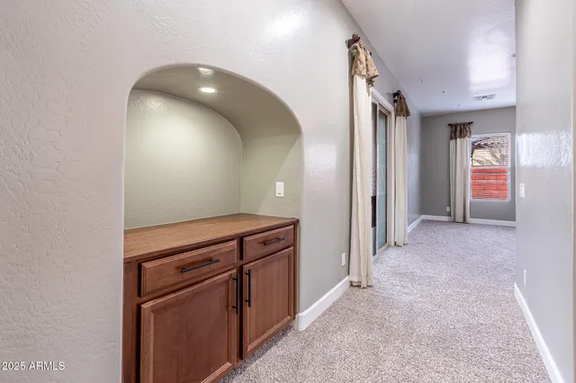 a view of a hallway with closet