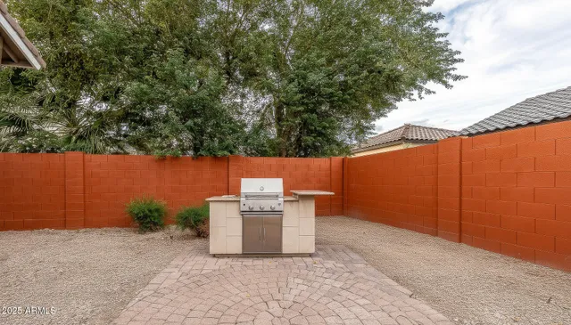 a backyard of a house with seating space