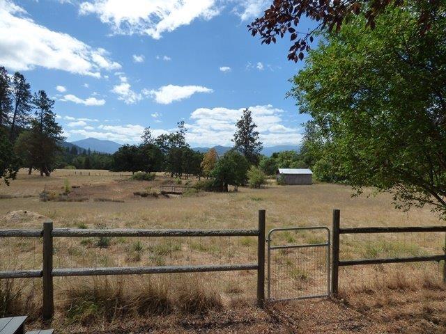 705 Missouri Flat Road Grants Pass, OR 97527 - Photo 32 of 35 Gate to back field, pole barn in field f