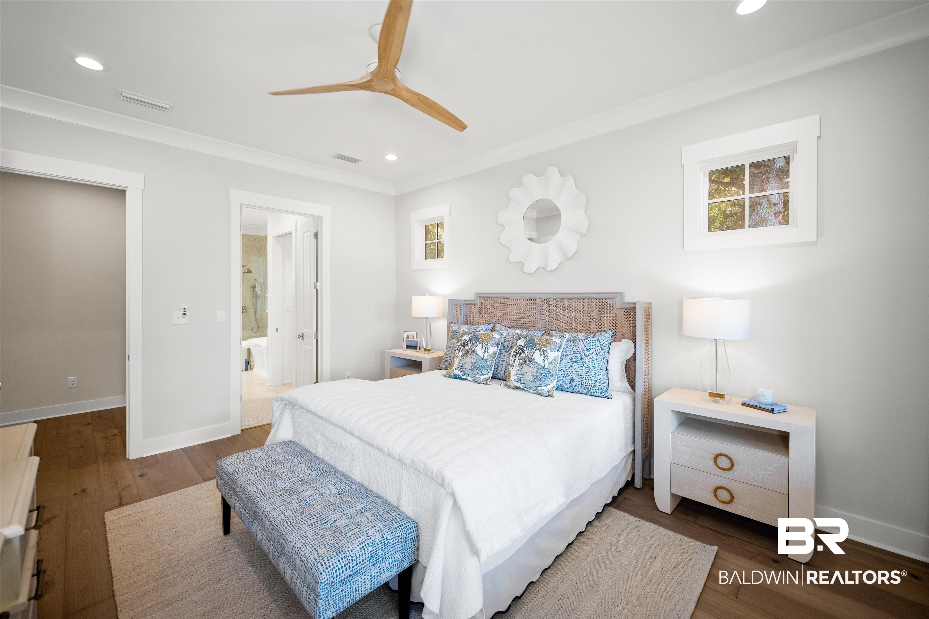 156 Hyacinth Street Fairhope, AL 36532 - Photo 32 of 61 Bedroom featuring hardwood / wood-style flooring, recessed lighting, ceiling fan, connected bathroom, and crown molding