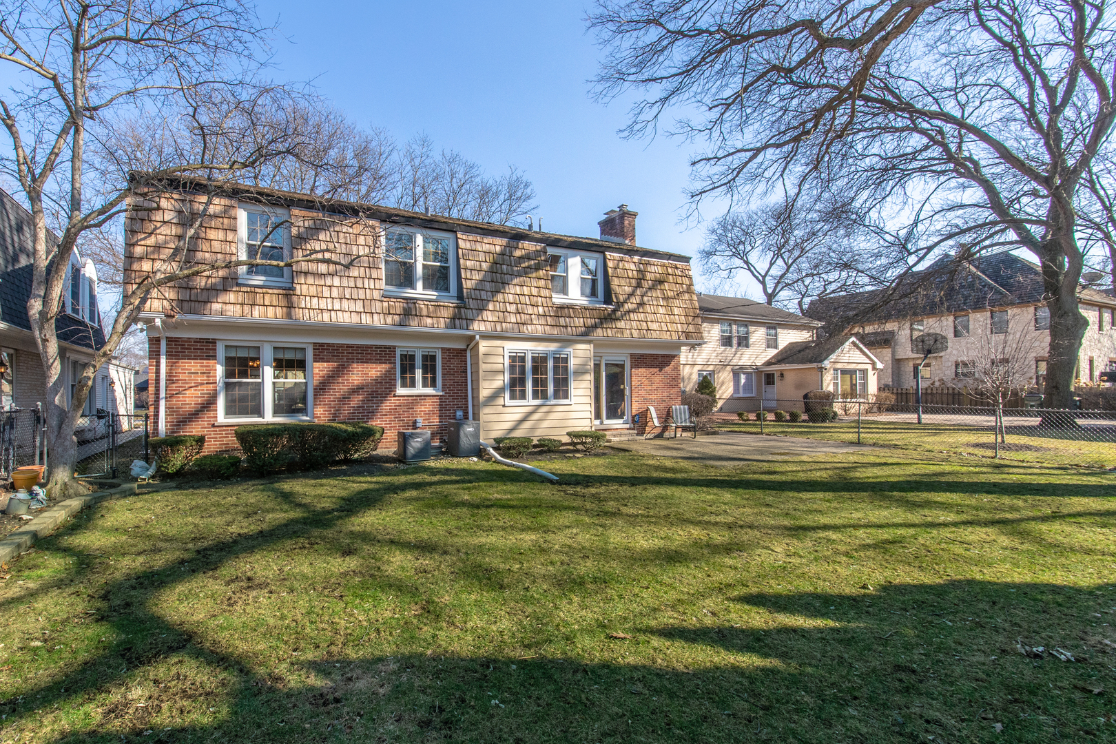 812 South Seminary Avenue Park Ridge, IL 60068 - Photo 13 of 35 a front view of a house with a garden and swimming pool