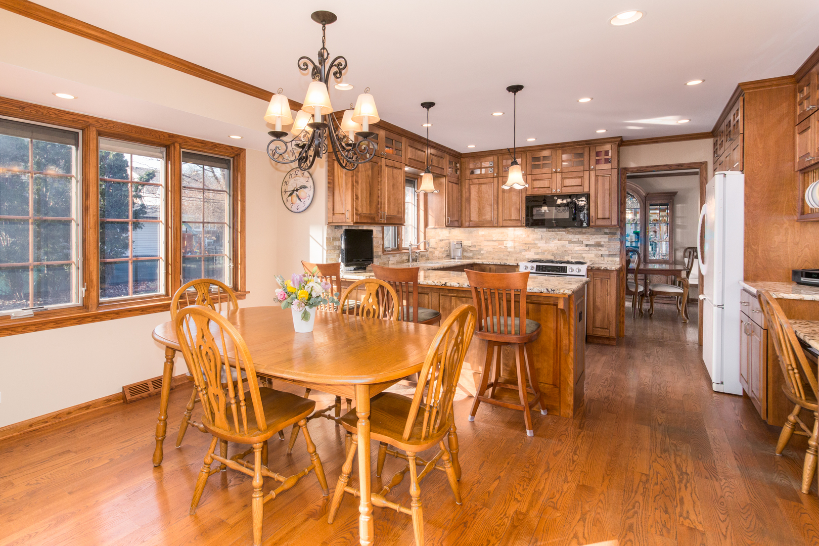 812 South Seminary Avenue Park Ridge, IL 60068 - Photo 17 of 35 a view of a dining room with furniture window and wooden floor