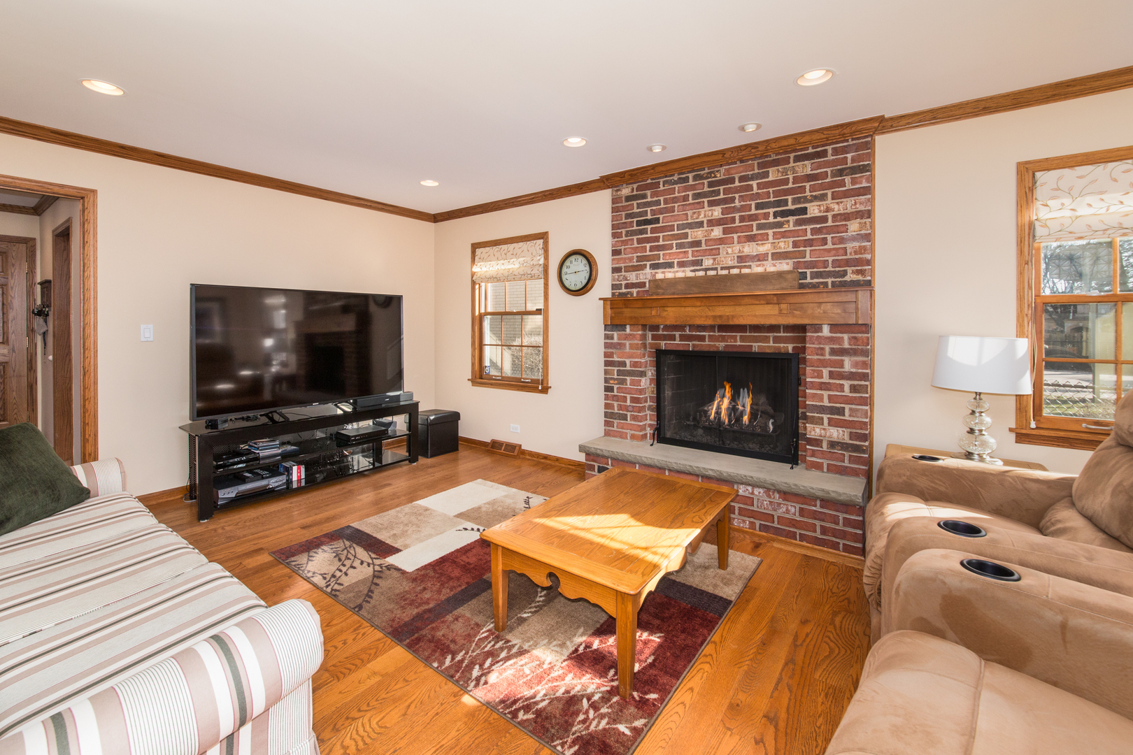 812 South Seminary Avenue Park Ridge, IL 60068 - Photo 4 of 35 a living room with furniture and a flat screen tv