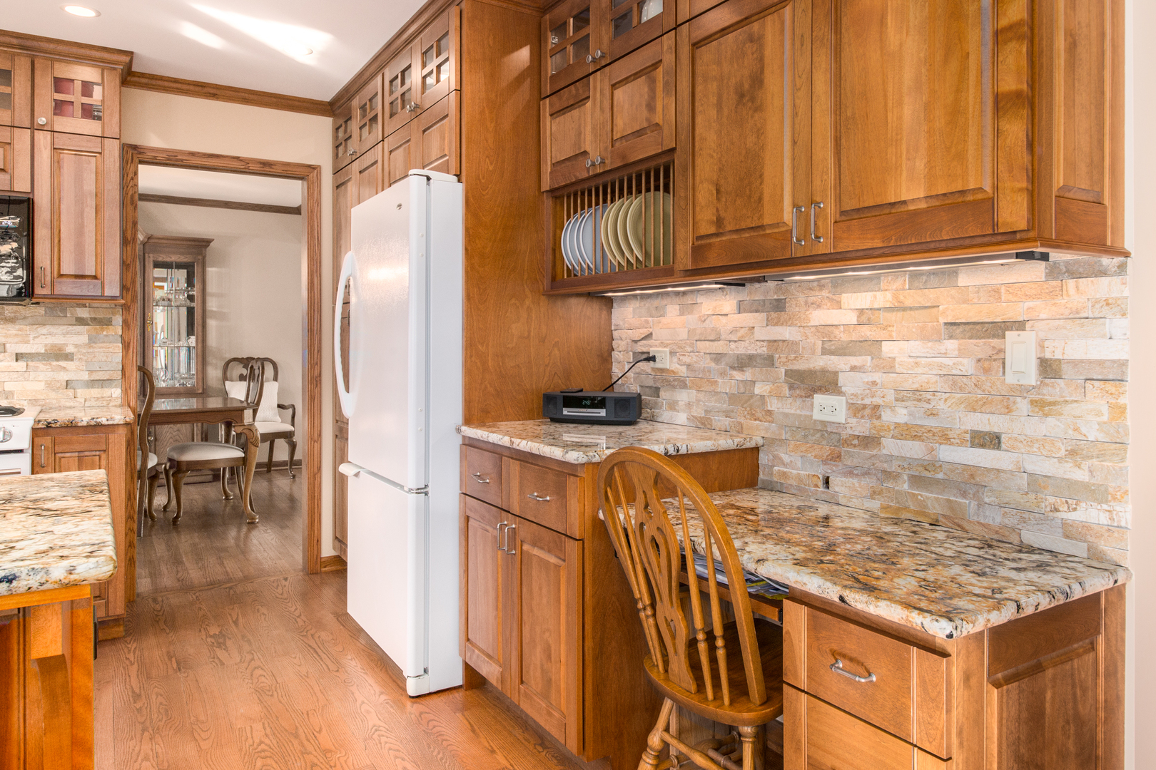 812 South Seminary Avenue Park Ridge, IL 60068 - Photo 6 of 35 a kitchen with stainless steel appliances granite countertop a stove a refrigerator and a cabinets