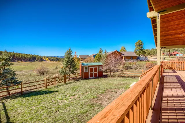 a view of a lake with a outdoor space