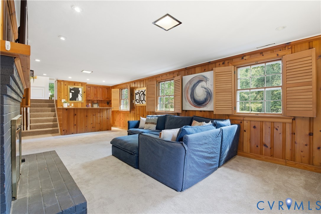 6405 Buckhill Road Richmond, VA 23225 - Photo 33 of 71 Expansive recreation room featuring wood-paneled w
