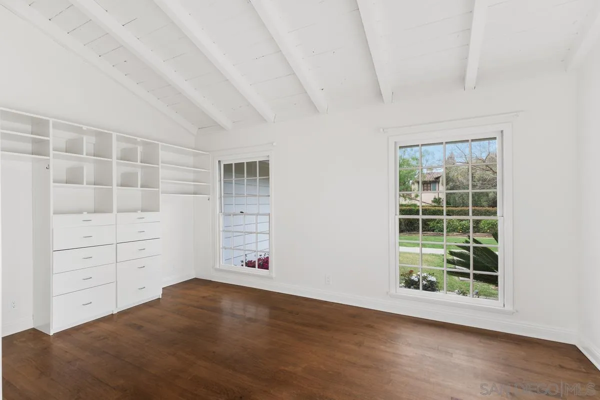 6229 La Jolla Mesa Drive La Jolla, CA 92037 - Photo 18 of 39 an empty room with windows