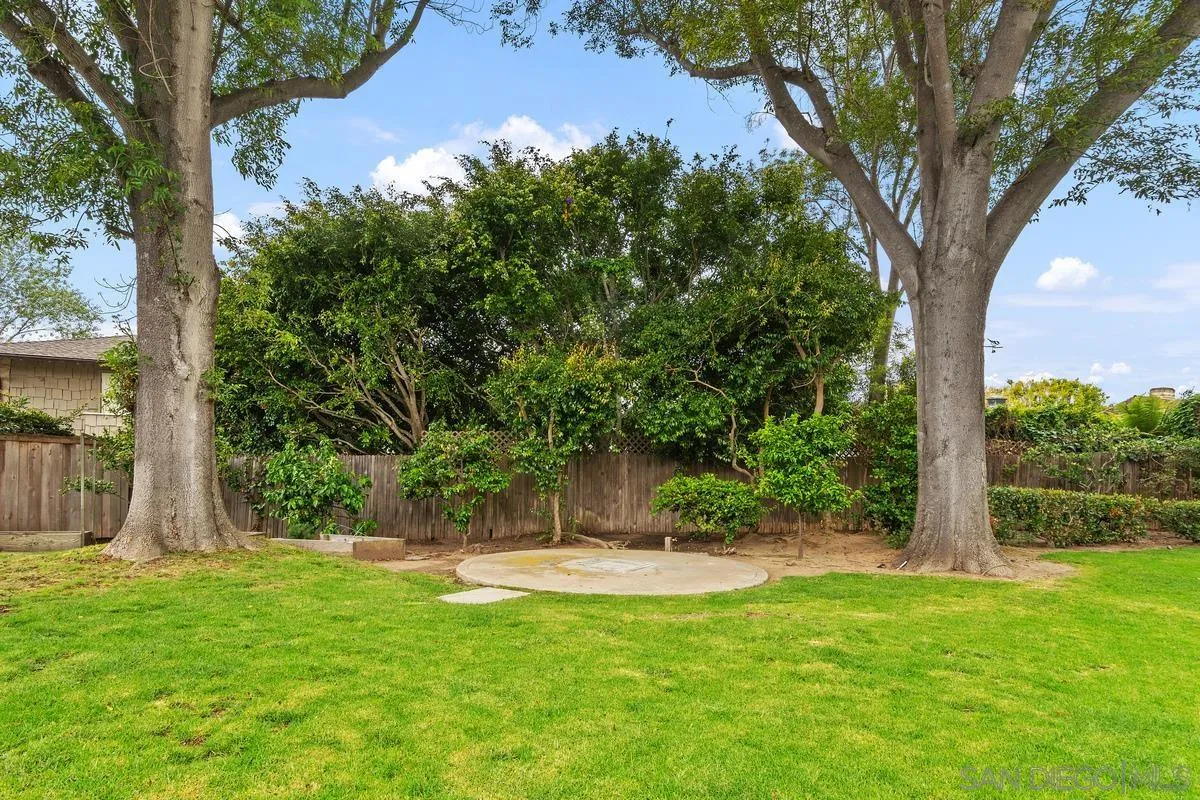 6229 La Jolla Mesa Drive La Jolla, CA 92037 - Photo 35 of 39 a swimming pool with outdoor seating and yard