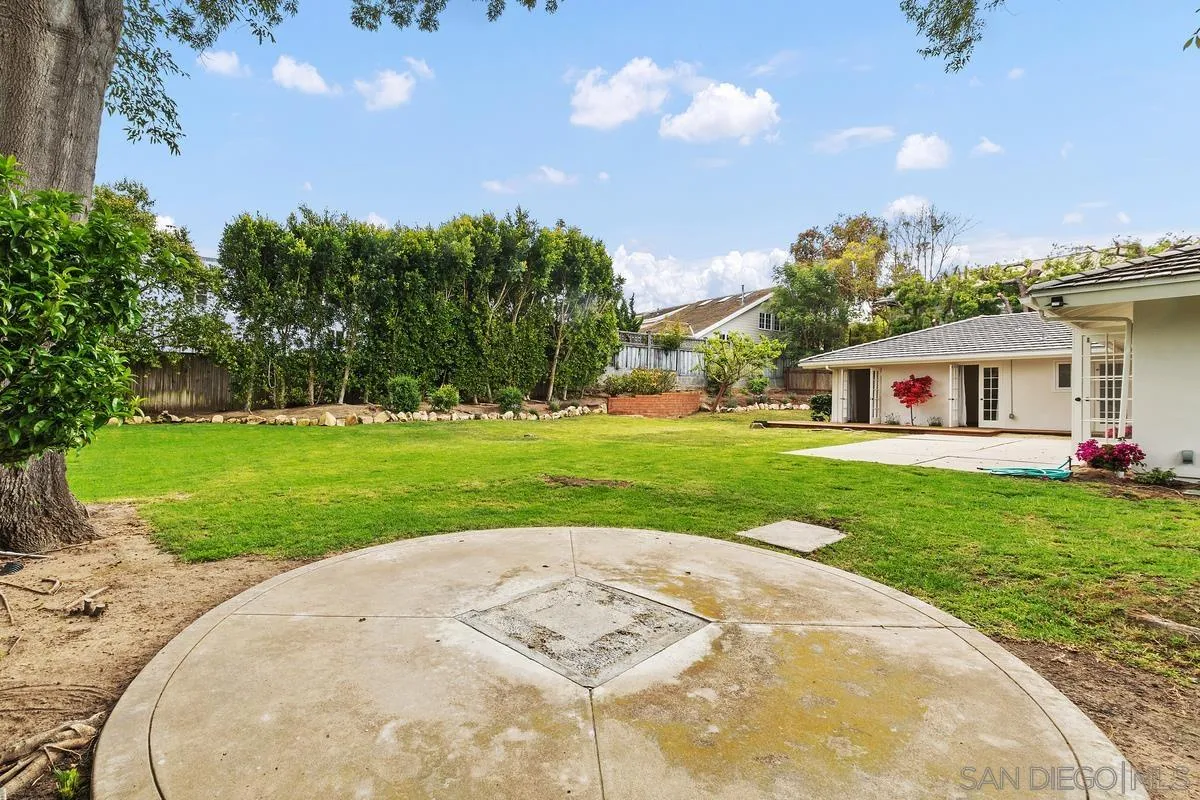 6229 La Jolla Mesa Drive La Jolla, CA 92037 - Photo 36 of 39 a view of a house with a backyard