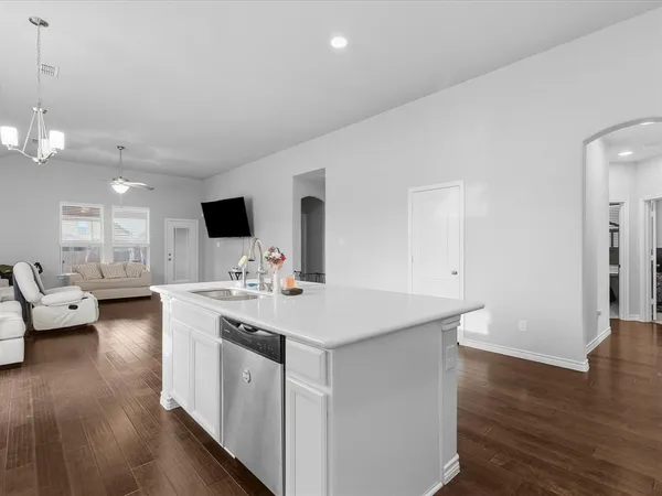a view of living room with granite countertop furniture and fireplace