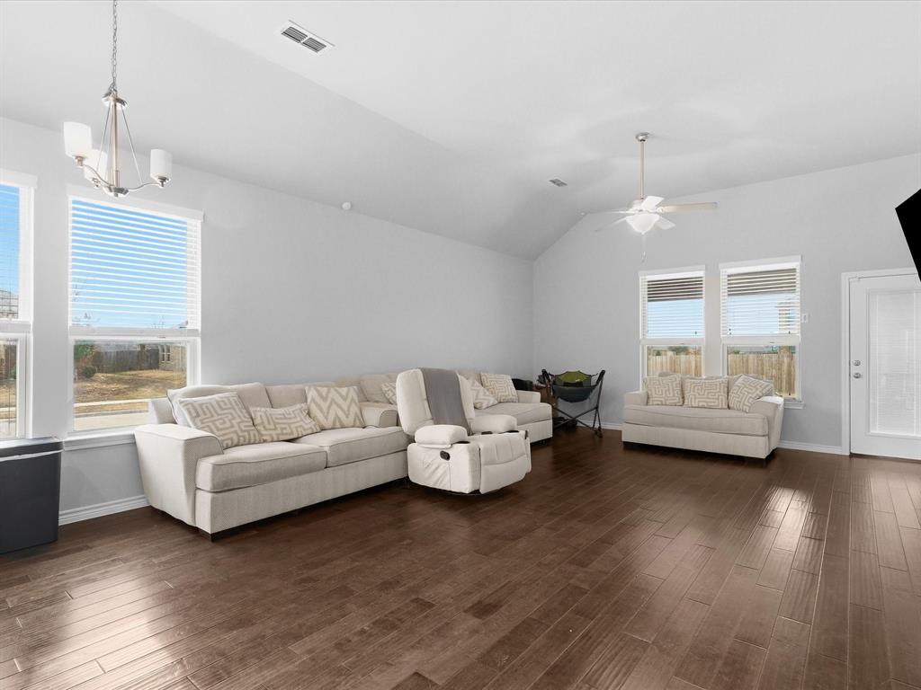 120 Garner Court Forney, TX 75126 - Photo 12 of 27 a living room with furniture and a large window
