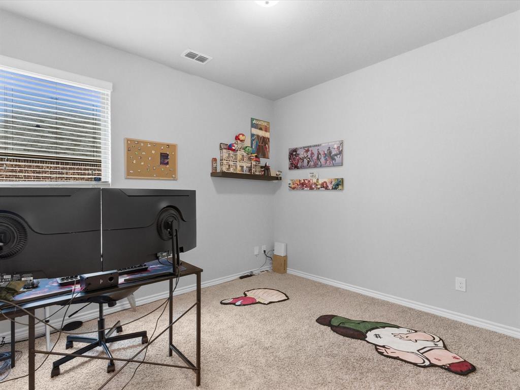 120 Garner Court Forney, TX 75126 - Photo 20 of 27 a view of a workspace with furniture