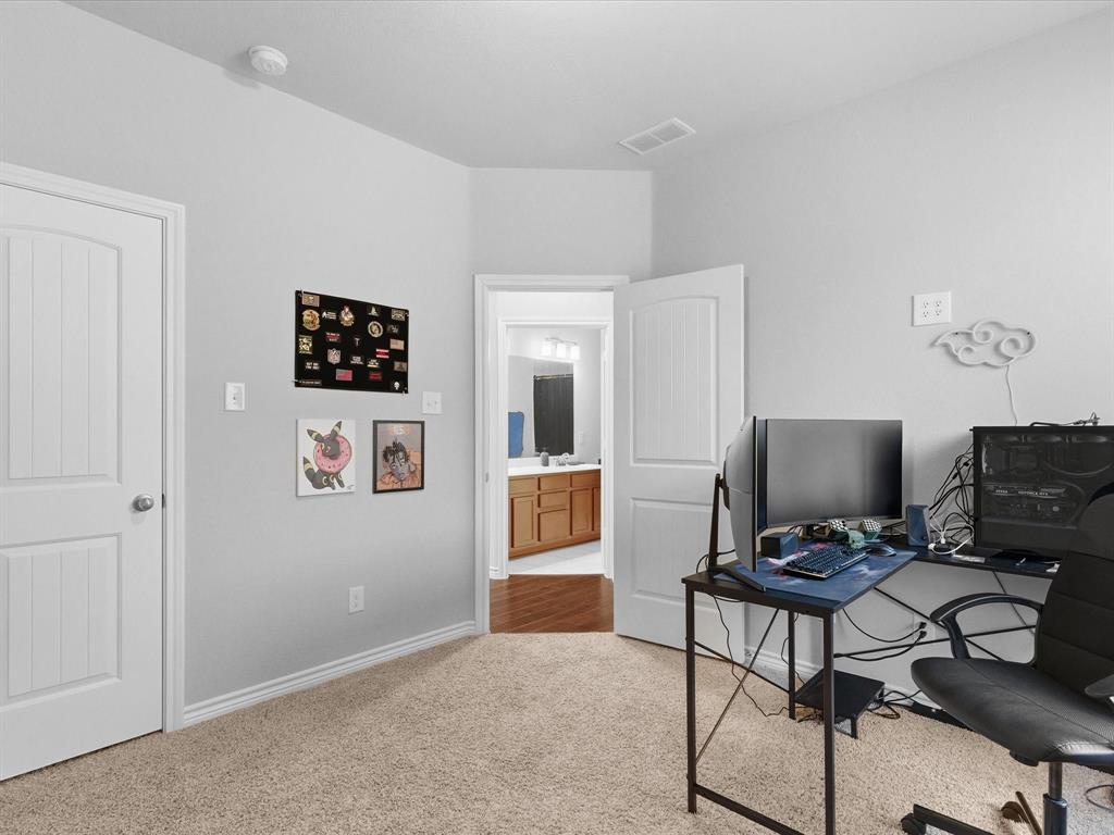 120 Garner Court Forney, TX 75126 - Photo 21 of 27 a view of a workspace with furniture and a window
