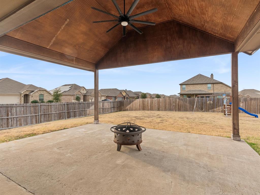 120 Garner Court Forney, TX 75126 - Photo 26 of 27 a swimming pool with an outdoor seating