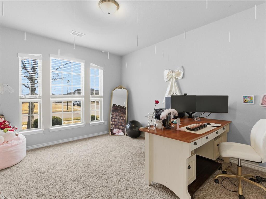 120 Garner Court Forney, TX 75126 - Photo 5 of 27 a room with furniture and a window