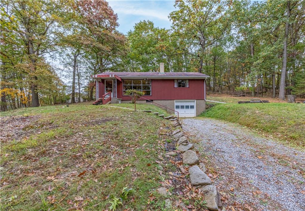 1194 Donnellville Road Natrona Heights, PA 15065 - Photo 1 of 20 a view of a house with a yard