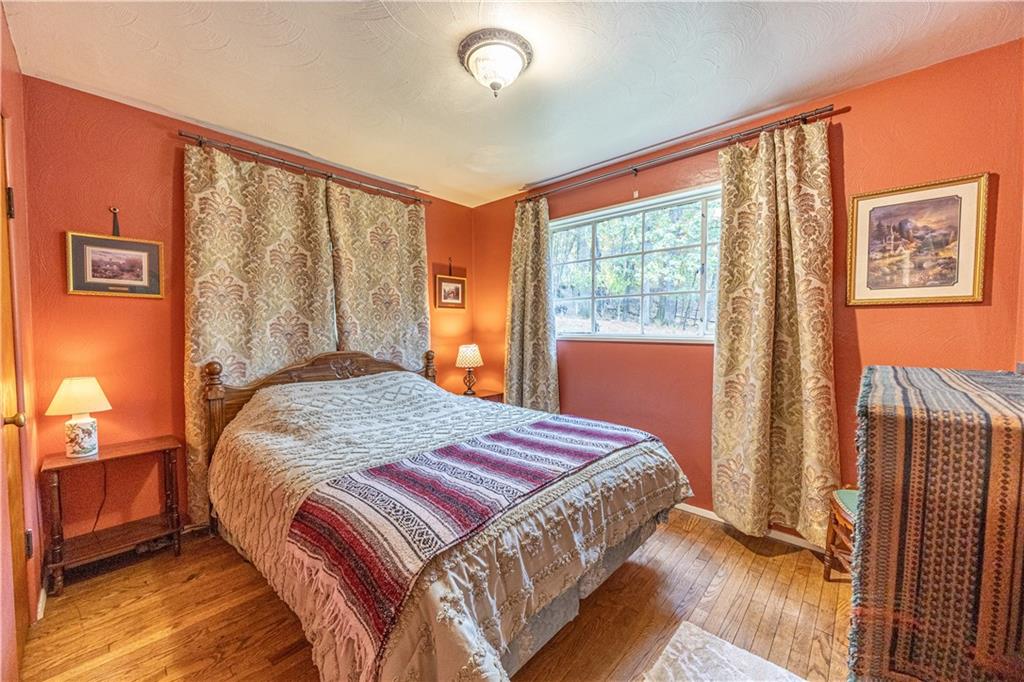 1194 Donnellville Road Natrona Heights, PA 15065 - Photo 12 of 20 a bedroom with a large bed and a window