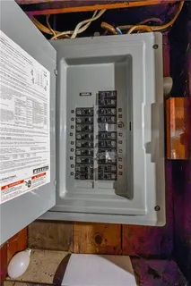 a bathroom with a bathtub and a window