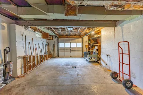 a view of an empty room with stairs