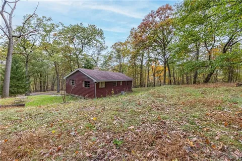 a fire hydrant in the middle of a field