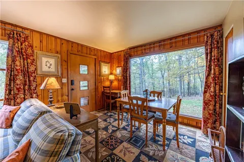 a view of a livingroom with furniture and patio