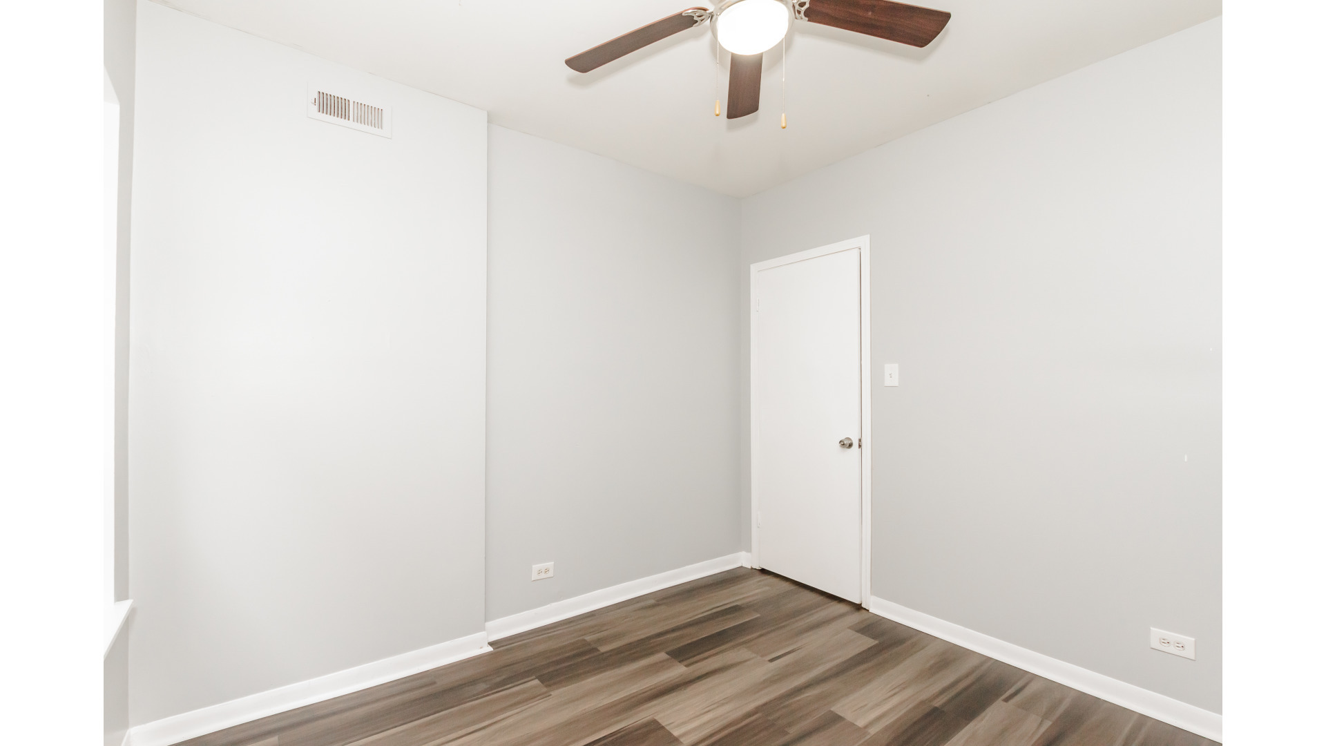 2400 North Kilbourn Avenue, Unit 2 Chicago, IL 60639 - Photo 8 of 10 a view of an empty room with a window