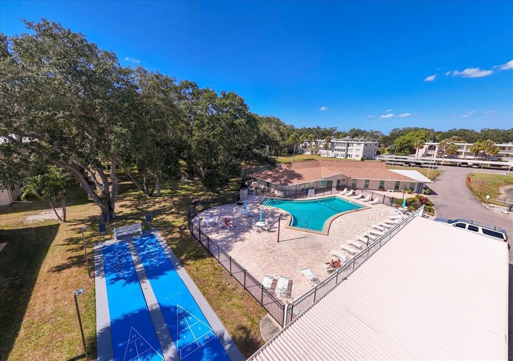 821 Patricia Avenue, Unit 202 Dunedin, FL 34698 - Photo 28 of 37 a view of a terrace with sitting area