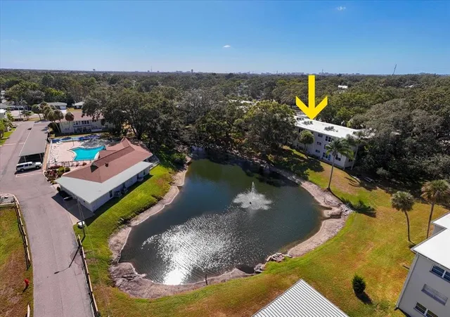 a view of a swimming pool with a lake view